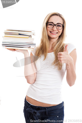 Image of Female model carrying books doing thumbs up sign