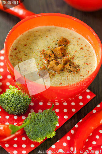 Image of Bowl of chili pepper and broccoli soup