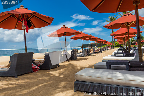 Image of Beach umbrellas on a beautiful beach in Bali