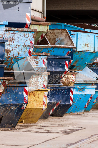 Image of Rows of empty garbage tips