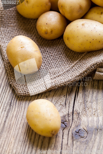 Image of Farm fresh  potatoes on a hessian sack