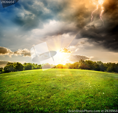 Image of Bright lightning over field