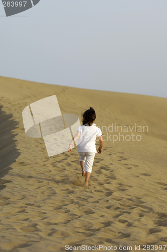 Image of child in desert