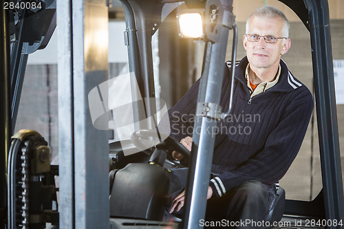 Image of Forklift driver posing