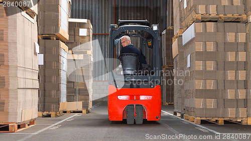 Image of Forklift driving backwards