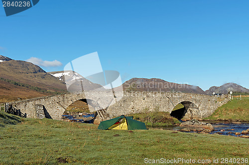 Image of Tent by Spey river at Garva bridge, Scotland in spring