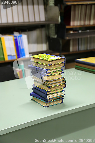 Image of Stack of books on the table