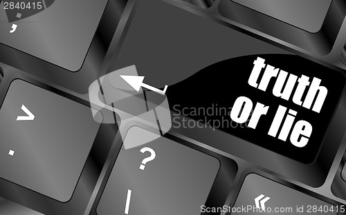 Image of truth or lie button on computer keyboard key