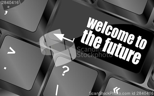 Image of welcome to the future text on laptop keyboard key