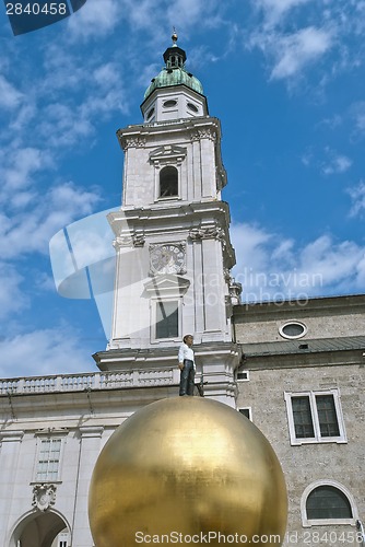 Image of Man on Golden Sphere in Salzburg