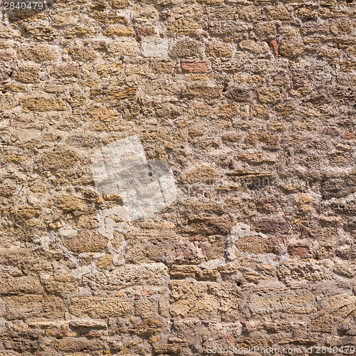 Image of Old Wall Constructed Of Stone Bricks.