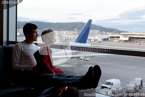 Image of family at the airport