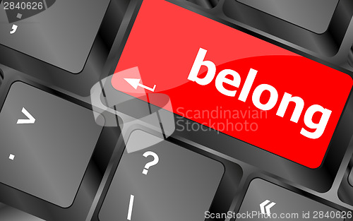 Image of belong word on keyboard key, notebook computer button