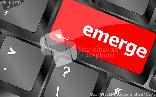 Image of emerge word on keyboard key, notebook computer button