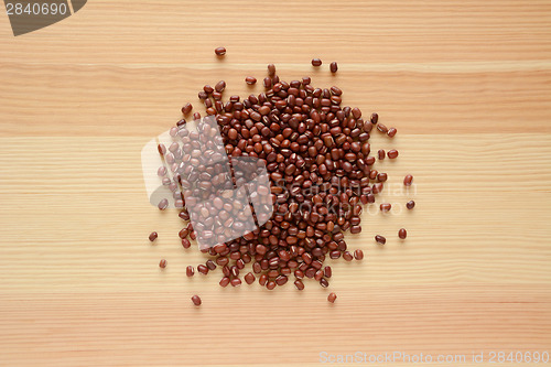 Image of Adzuki, aduki or azuki beans on wood