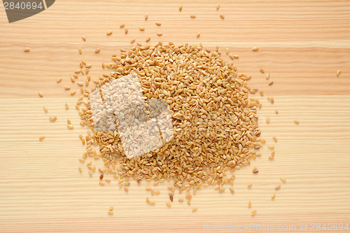 Image of Golden linseed on wood