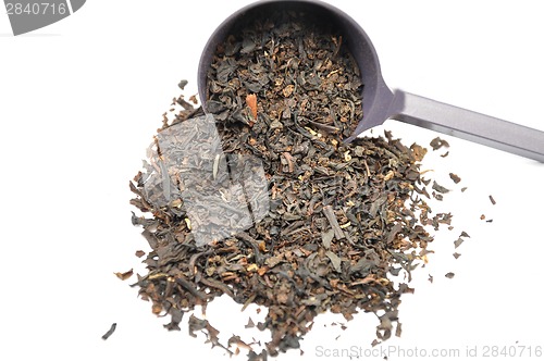 Image of Detailed but simple image of black tea mix with metering spoon
