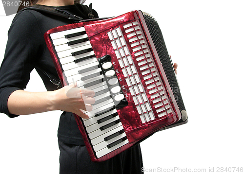 Image of Cutout with a woman playing accordion on white