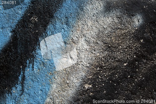 Image of Graffiti on a grainy concrete wall