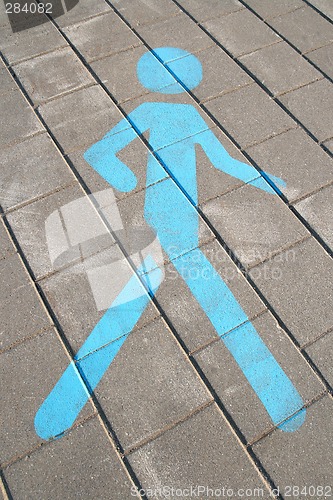 Image of Pedestrian sign on the pavement