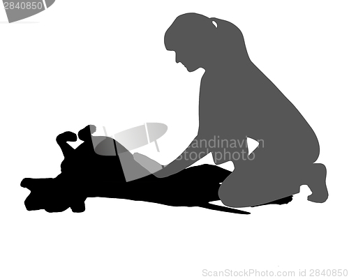 Image of Woman caresses a dog