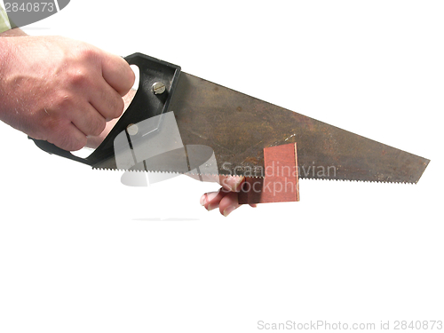 Image of Cutout with hand and hand saw on white background