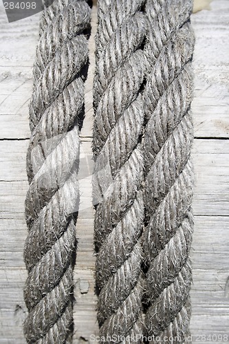 Image of Boat rope on wooden background