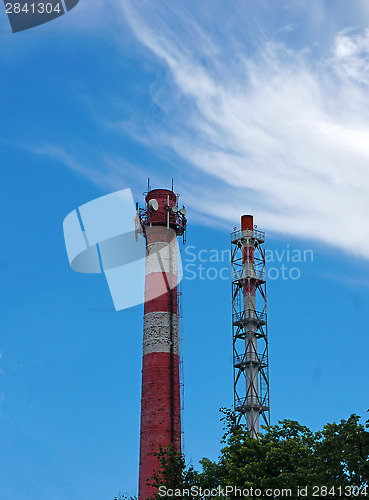 Image of Two pipe plant on blue sky background