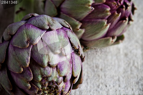 Image of two fresh artichokes