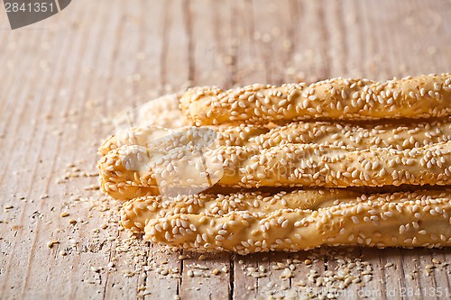 Image of bread sticks grissini with sesame seeds