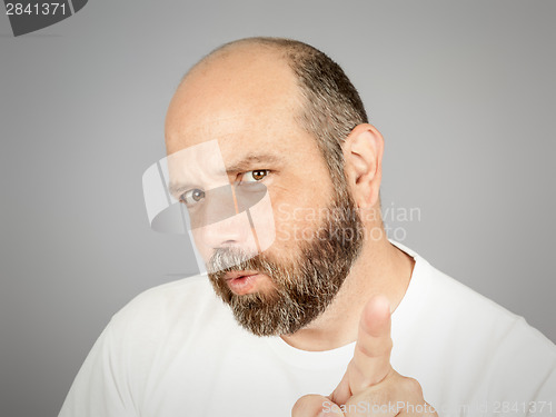 Image of bearded man pointing