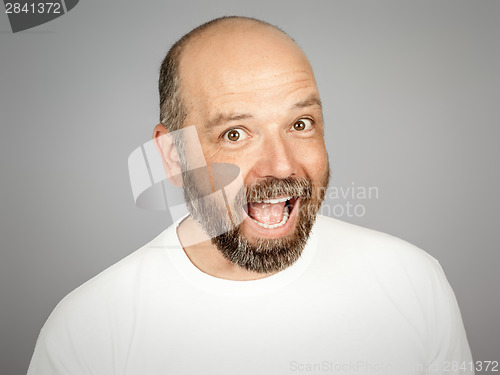 Image of bearded smiling man