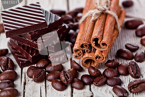 Image of chocolate sweets, cinnamon and coffee beans