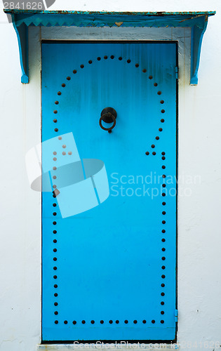 Image of Blue door with pattern from Sidi Bou Said in Tunisia