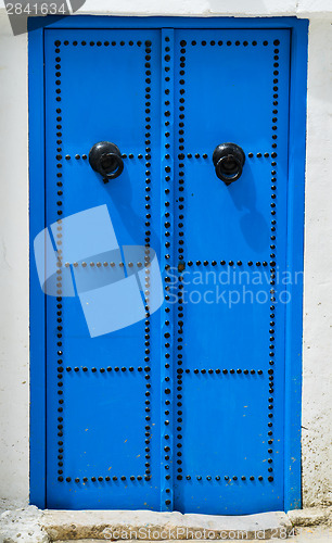 Image of Blue traditional door from Sidi Bou Said in Tunisia