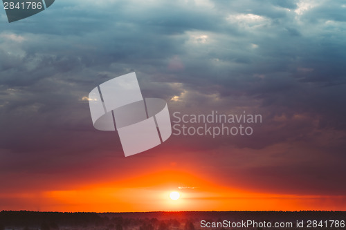 Image of Sky, Bright Blue, Orange And Yellow Colors Sunset