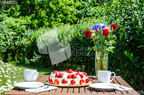 Image of Made summer table in garden