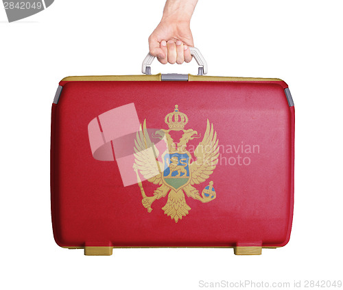 Image of Used plastic suitcase with stains and scratches