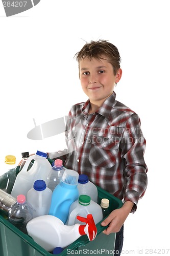 Image of Child carrying recycling