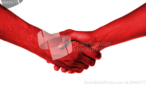 Image of Shaking hands of two people, male and female