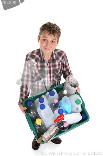 Image of Boy holding recycling container