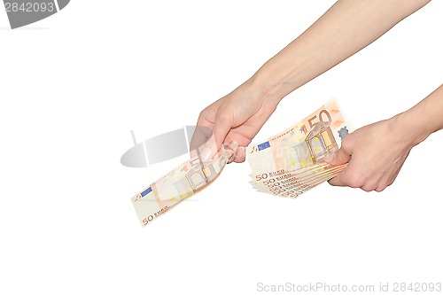 Image of Woman pays or giving cash Euro banknotes