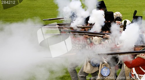 Image of soldiers shooting with blackpowder