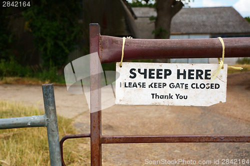 Image of Weathered notice on a farm gate