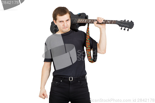 Image of Young man with electric guitar isolated on white background. Per