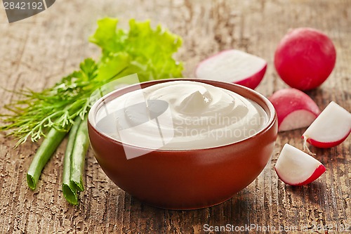 Image of sour cream and vegetables