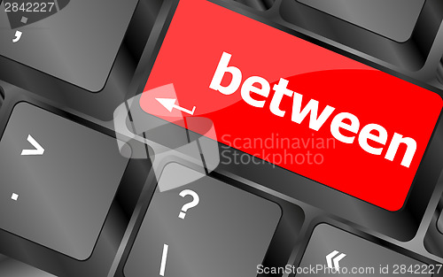 Image of between button on computer pc keyboard key
