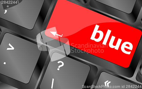 Image of blue button on computer pc keyboard key