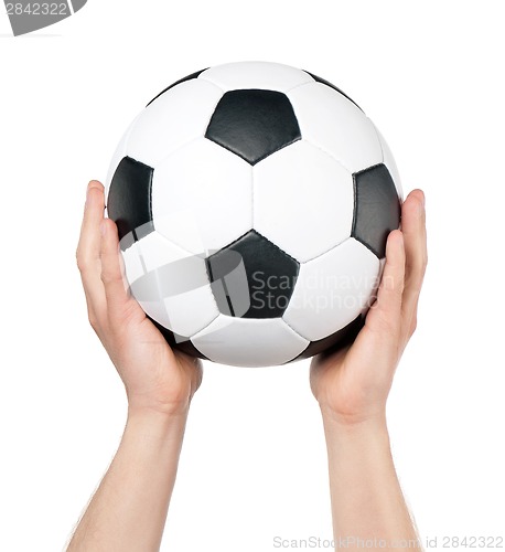 Image of Man with classic soccer ball