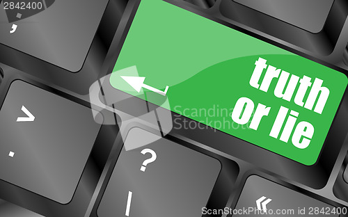 Image of truth or lie button on computer keyboard key